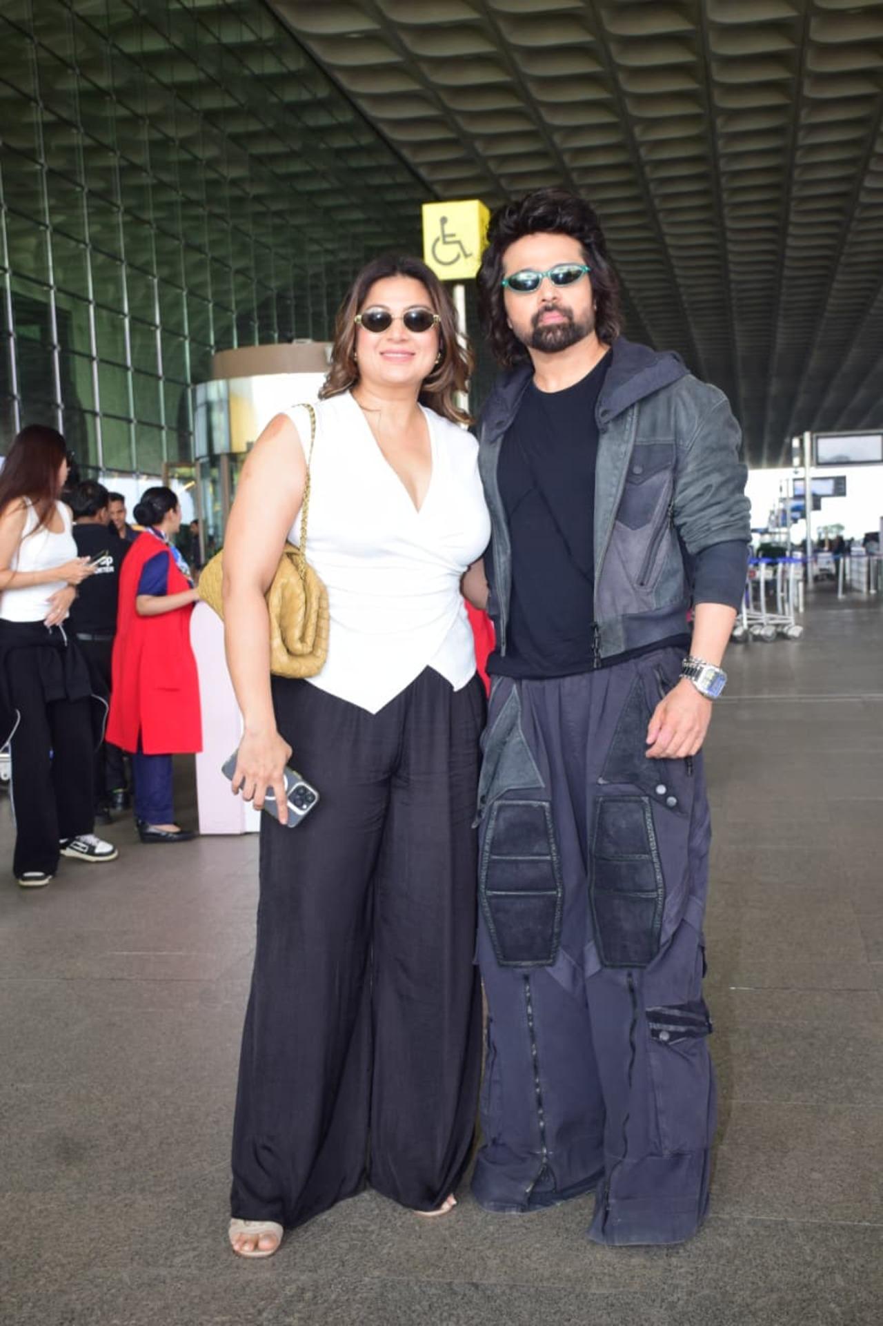 Himesh Reshammiya was spotted at the airport with his wife Sonia Kapur as they headed out of the city.